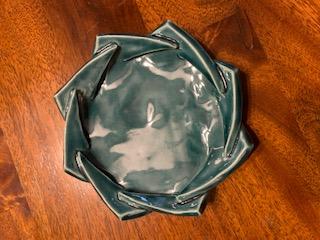 image of a ceramic dish with decorative edges