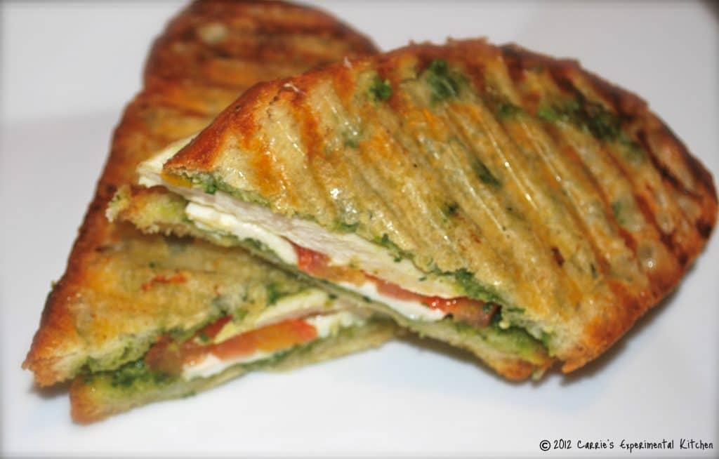 grilled sandwich with chicken, cheese and greens